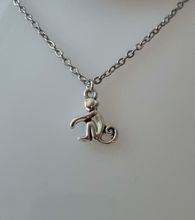 Halsband med en apa, apberlock / charm
