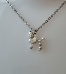 Halsband med en pudel, pudelberlock / charm