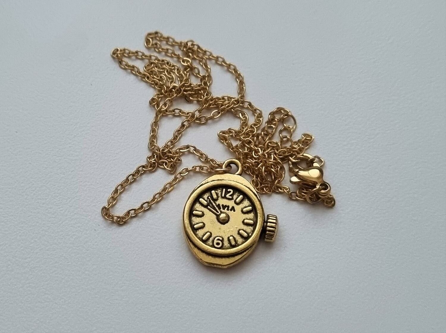 Halsband med klockberlock i steampunk (50 cm långt halsband)