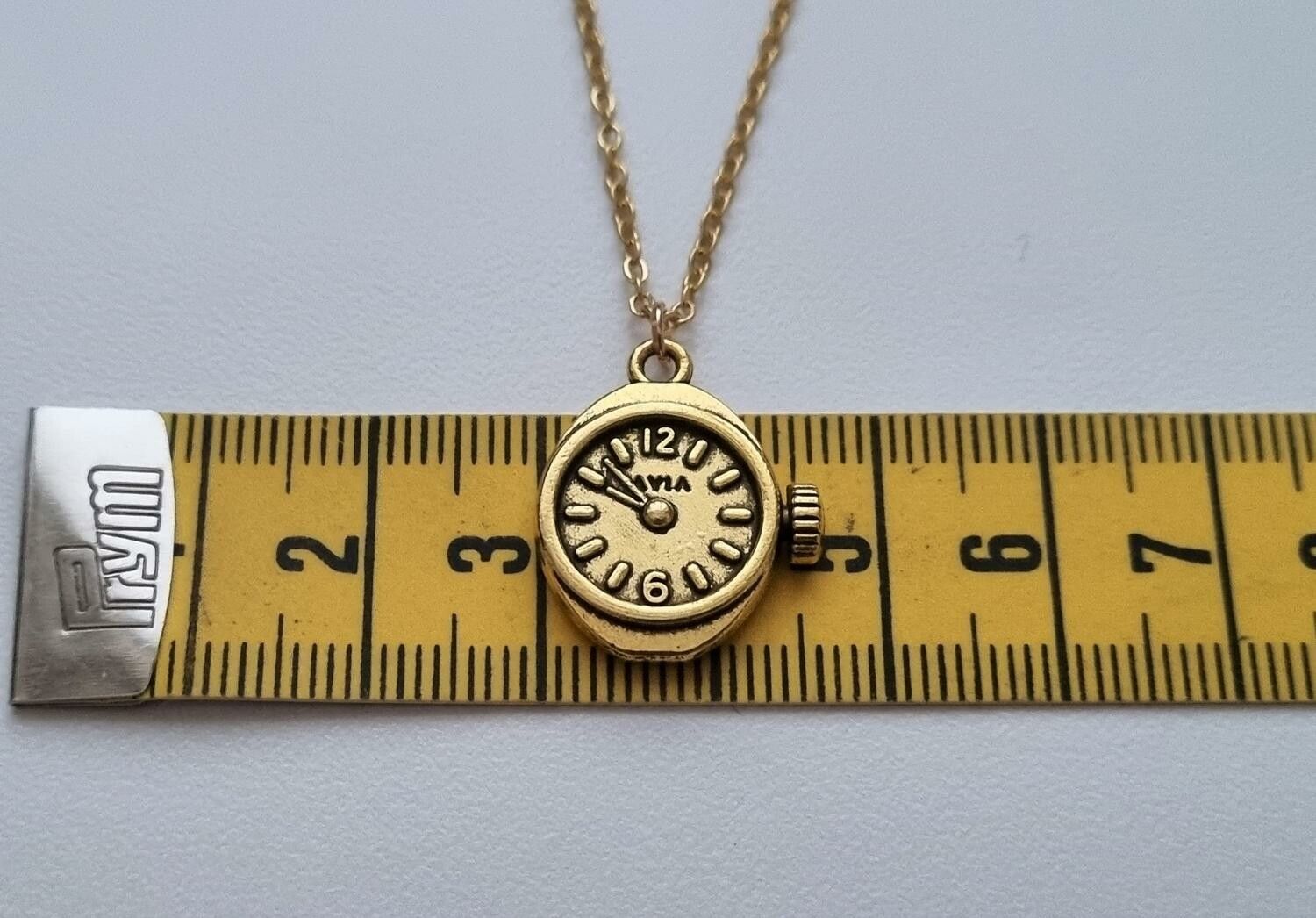 Halsband med klockberlock i steampunk (50 cm långt halsband)
