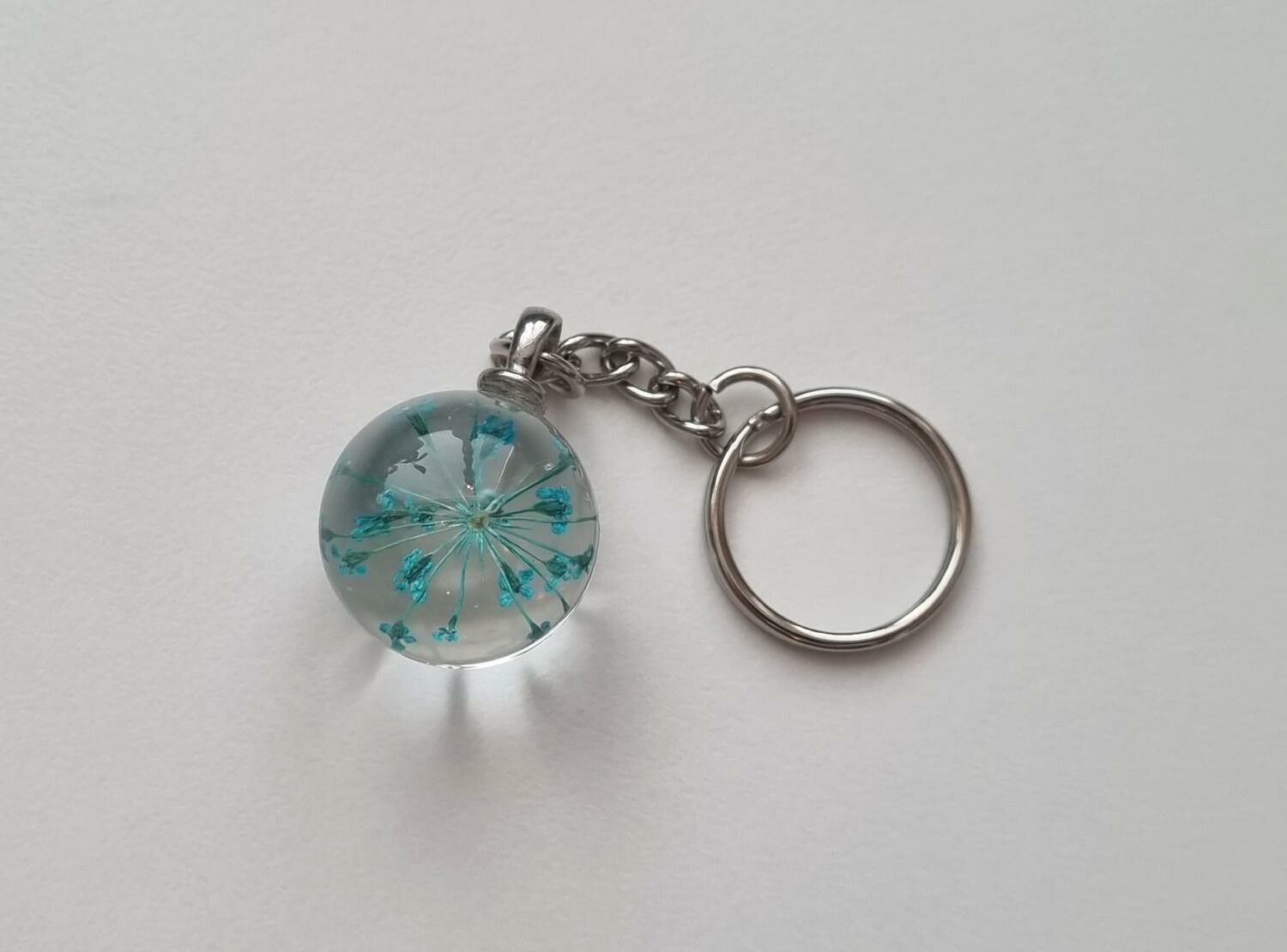 Nyckelring Glaskula glasboll med torkad blomma (Blå/turkos)