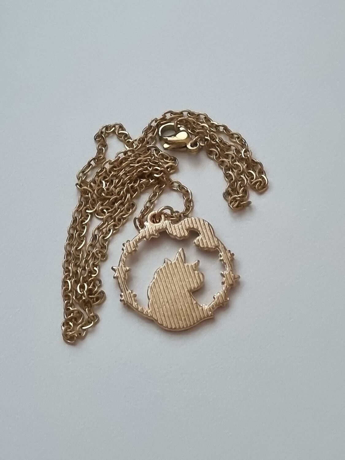Guldfärgat halsband (50 cm) med en enhörning