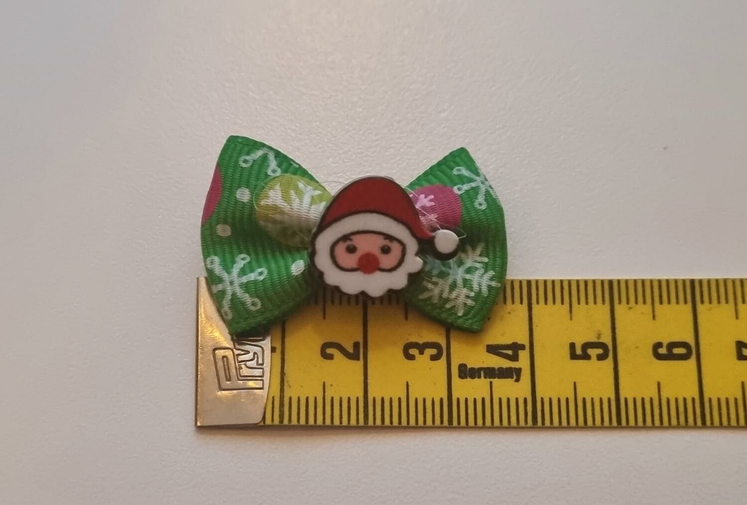 1 st grön rosett med jultema. Julrosett för hunden eller katten