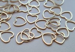 10 st guldfärgade hjärtan, berlocker / charms