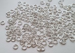 100 st jumprings / bindringar (4 mm, vita/ljus silver)