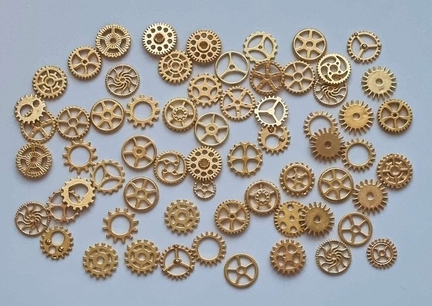 50 st kugghjul i steampunk, kuggar, gears minikugghjul (guldfärgade)