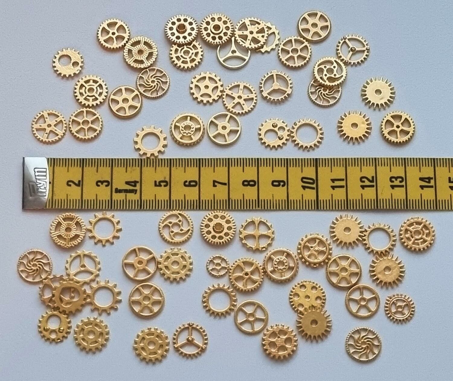 50 st kugghjul i steampunk, kuggar, gears minikugghjul (guldfärgade)
