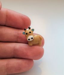 1 st brun ko / kossa. Miniatyr för dockhus, tittskåp, tågräls mm