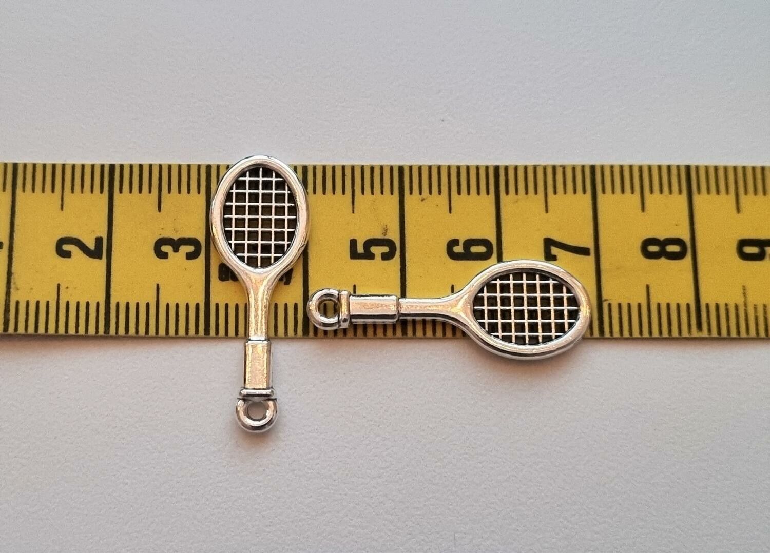 2 st miniatyrer berlocker - Tennisrack