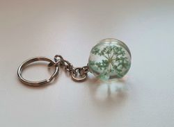 Nyckelring Glaskula glasboll med torkad blomma (turkos)