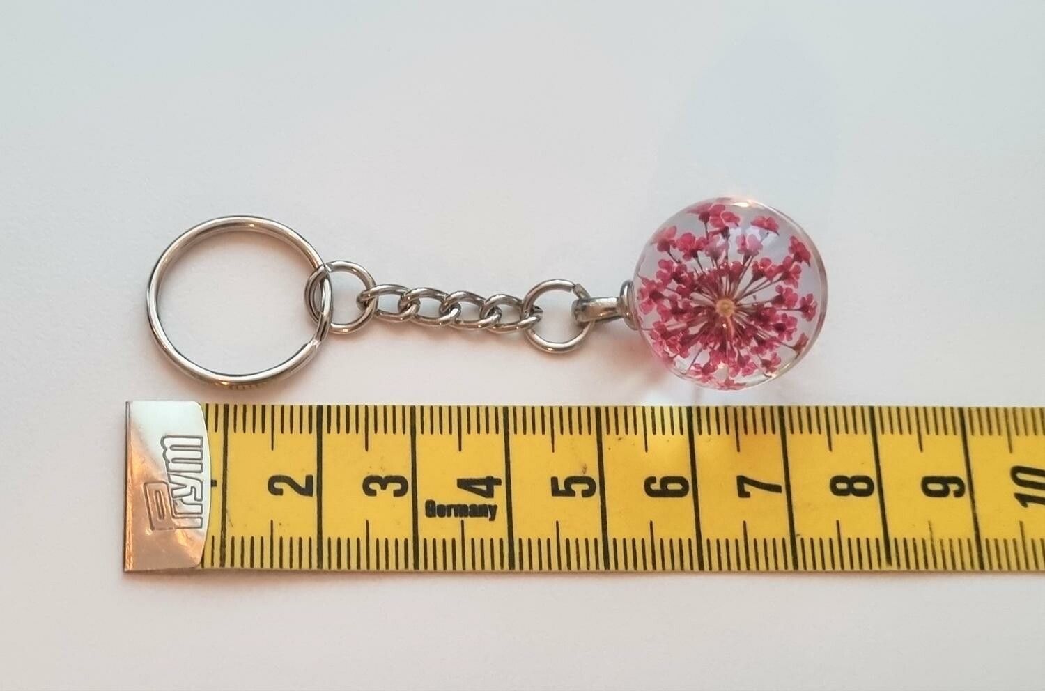 Nyckelring Glaskula glasboll med torkad blomma (Rosa/cerise)