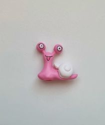 1 st rosa snigel med vitt skal. Miniatyr / figurin för dekoration