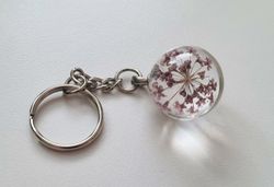 Nyckelring Glaskula glasboll med torkad blomma (rosa och lila)