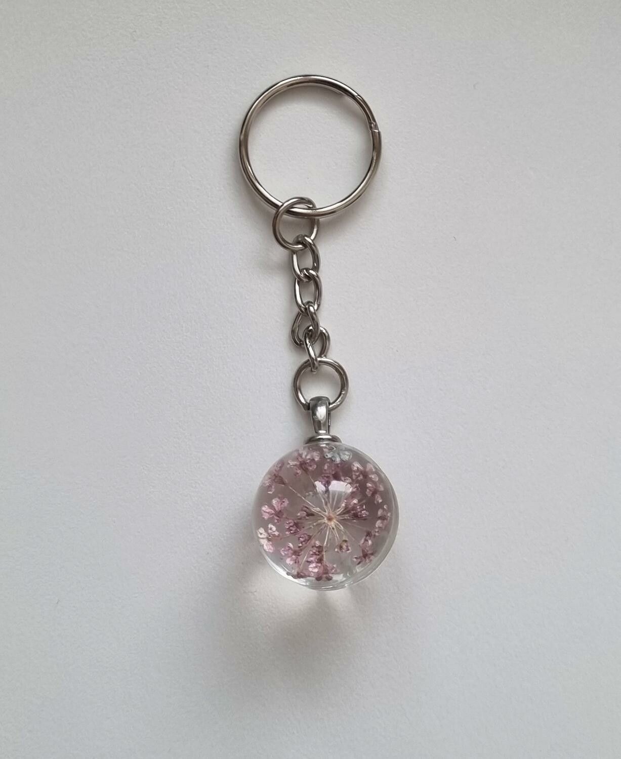 Nyckelring Glaskula glasboll med torkad blomma (rosa och lila)