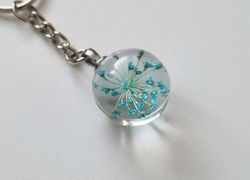 Nyckelring Glaskula glasboll med torkad blomma (blå/turkos)