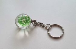 Nyckelring Glaskula glasboll med torkad blomma (grön)