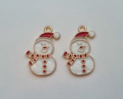 2 st snögubbar. Hängen / berlocker / charms till jul