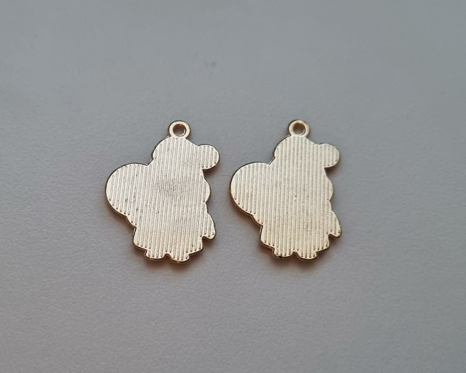 2 st tomtar. Hängen / berlocker / charms till jul