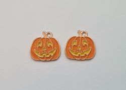 2 st Pumpor Berlocker / charms för Halloween (variant 2)
