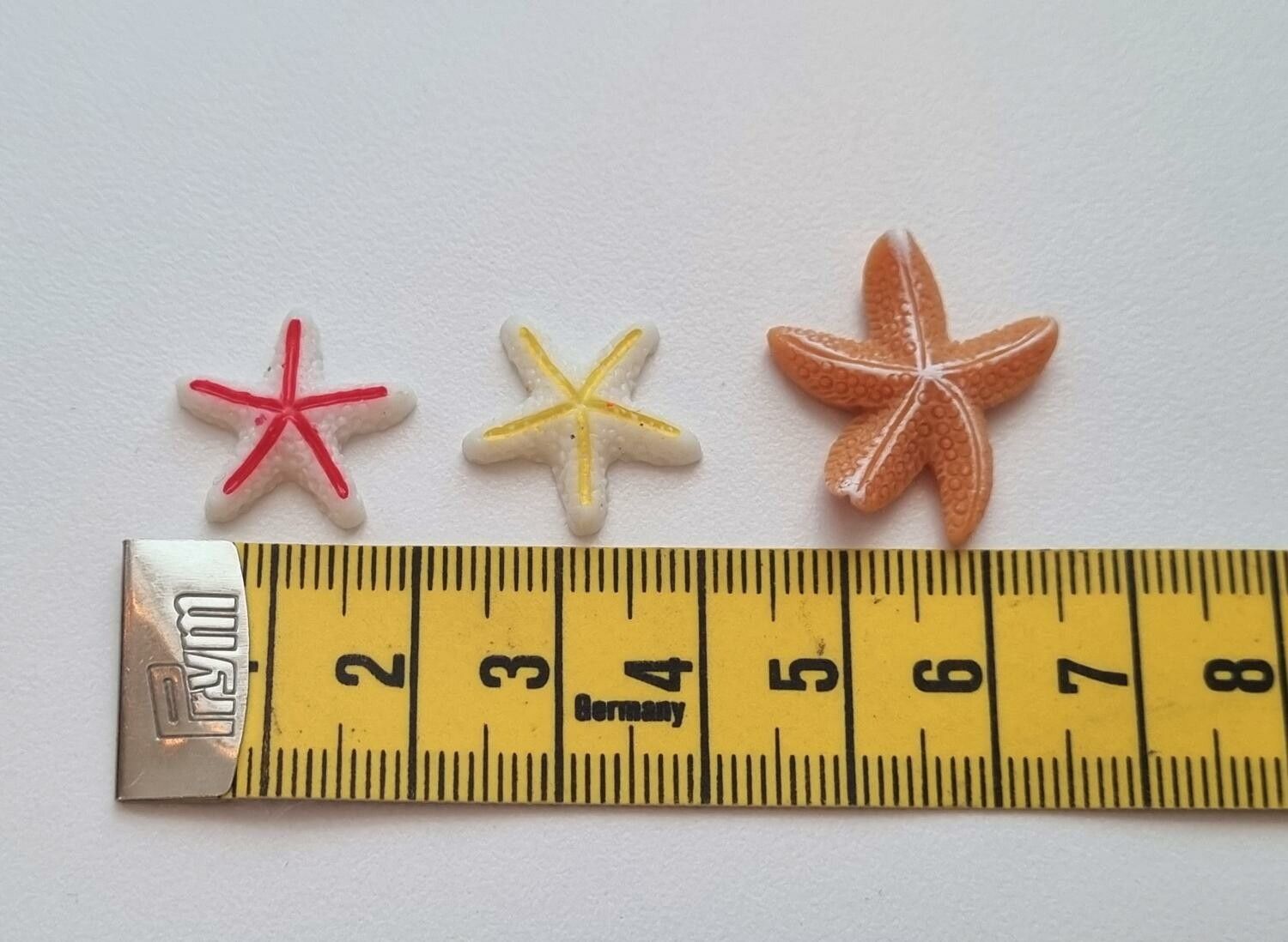 3 st sjöstjärnor i resin. Miniatyrer / figuriner för dockskåpet, tittskåp mm
