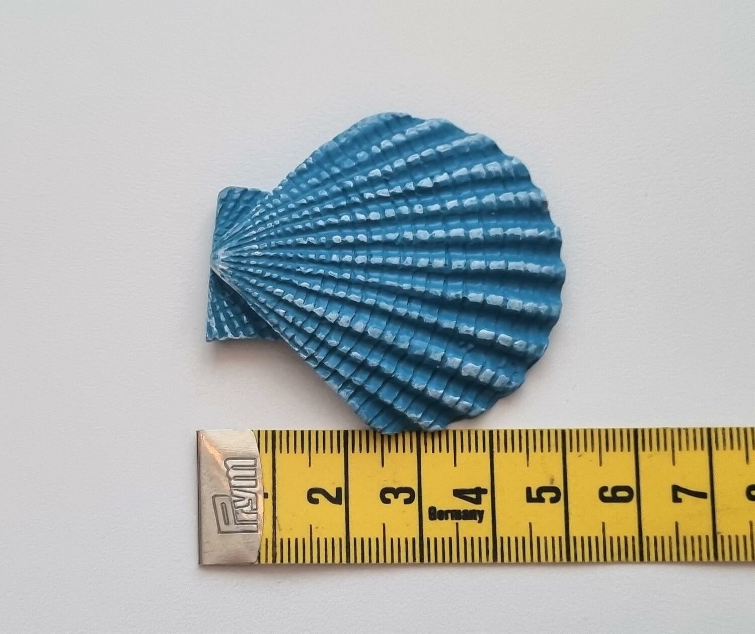 1 st snäckskal i resin. Större miniatyr / figurin för dockskåpet, tittskåp mm