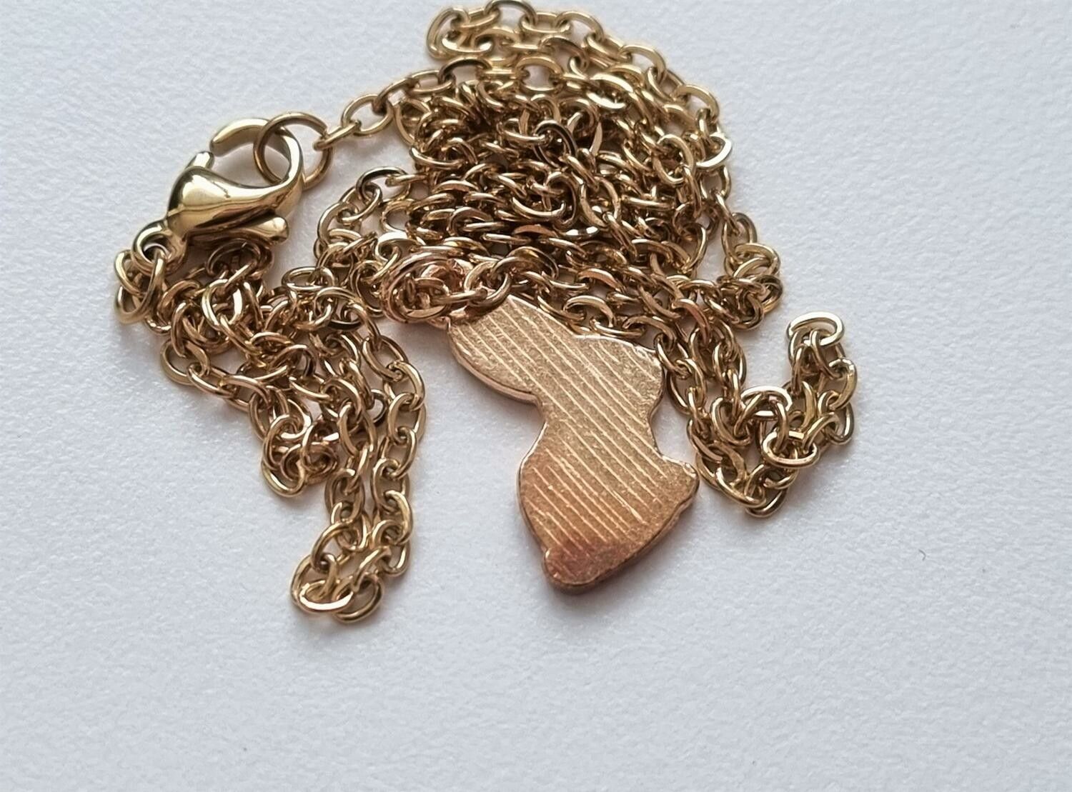 Halsband med en rosa kanin (50 cm lång kedja) Kaninberlock