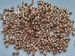 450 st guldfärgade klämpärlor, crimp beads (1,5 mm)