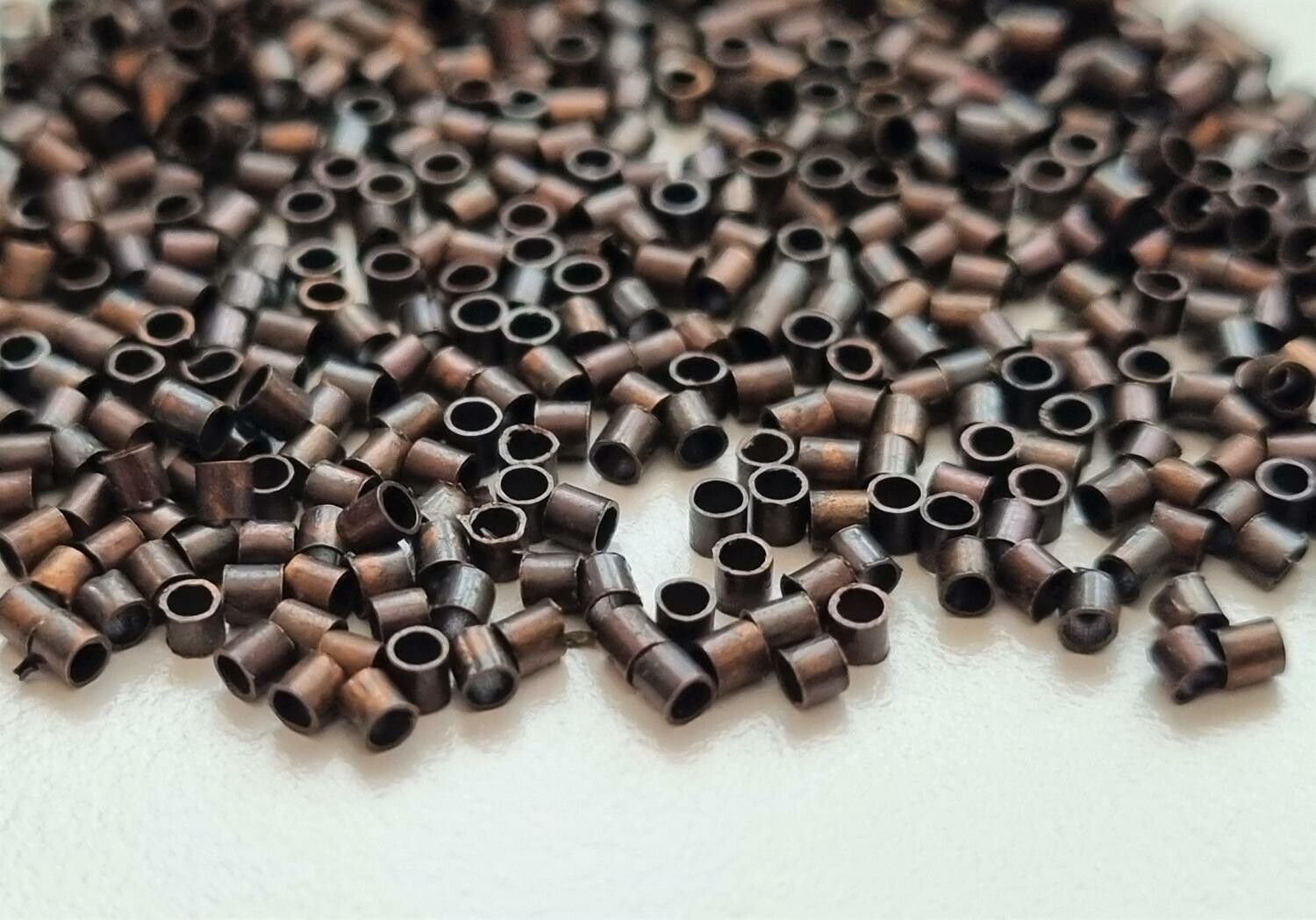 450 st kopparfärgade klämpärlor, crimp beads (1,5 mm)