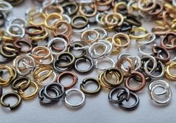 100 st jumprings / bindringar (4 mm, blandade färger)
