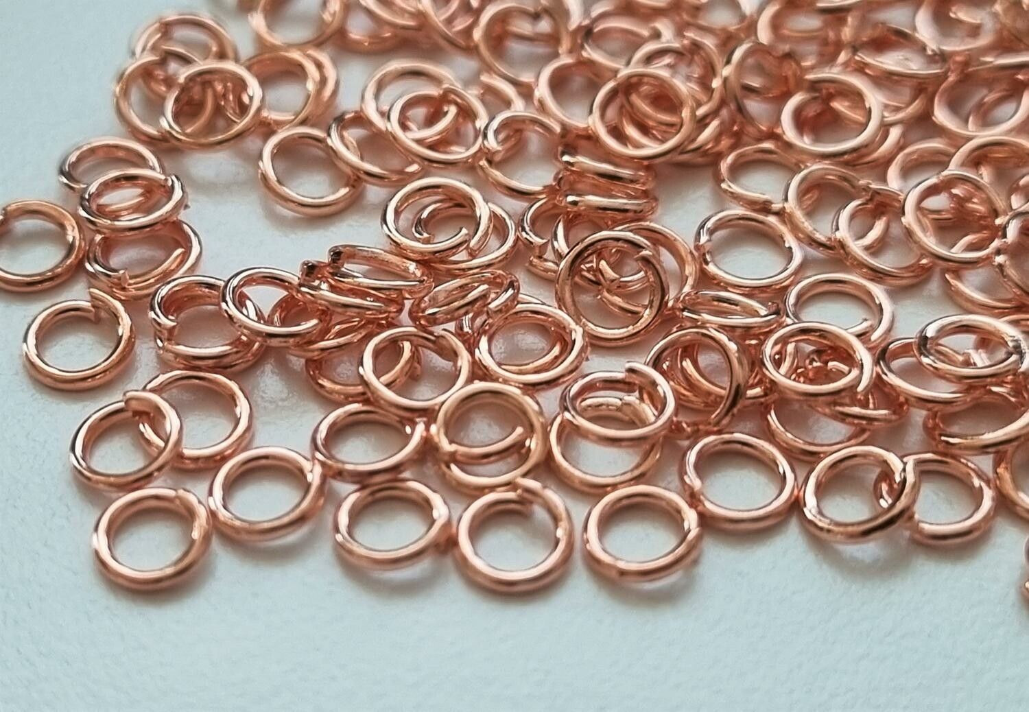 100 st jumprings / bindringar (4 mm, roseguld)
