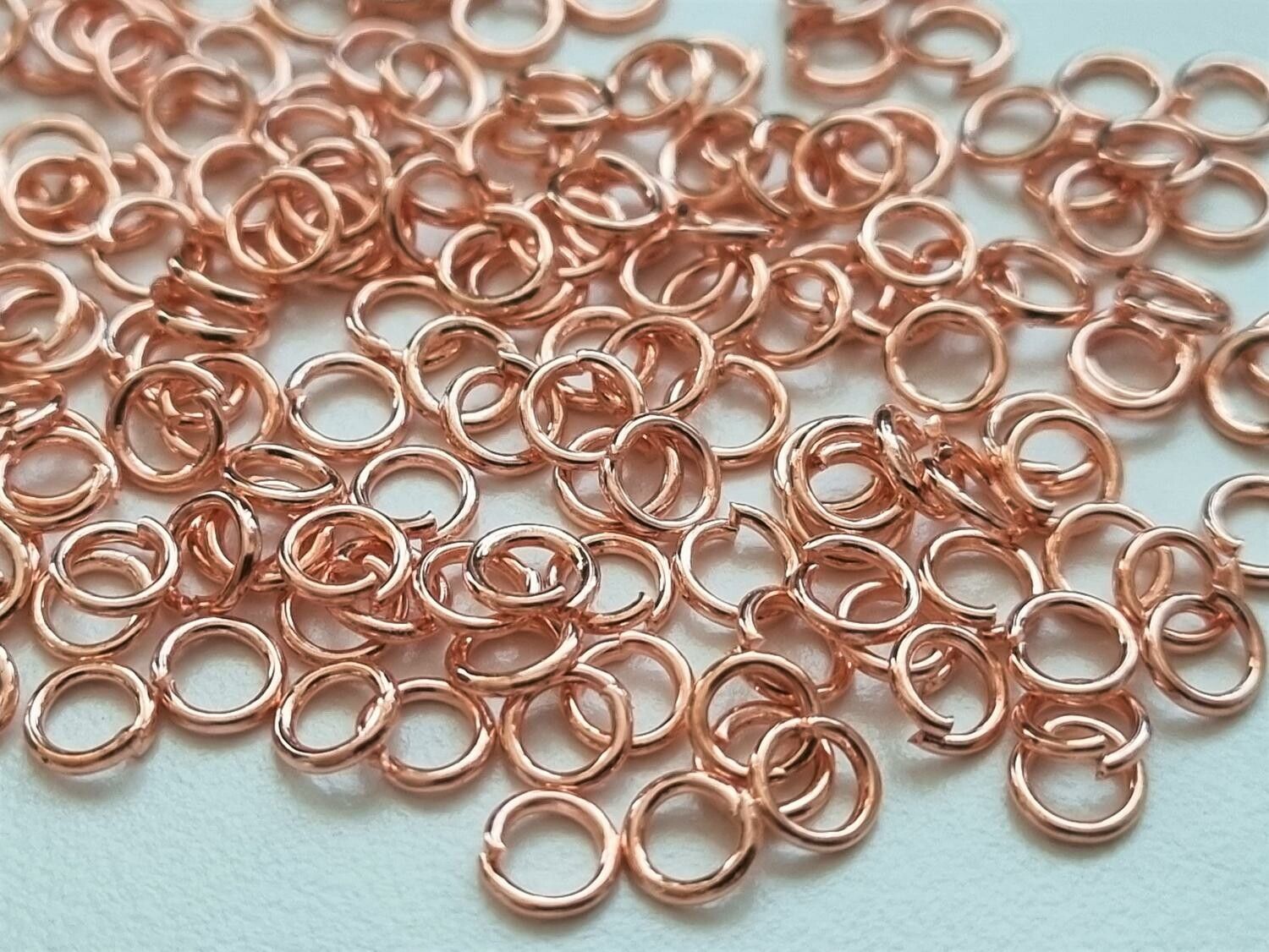 100 st jumprings / bindringar (4 mm, roseguld)