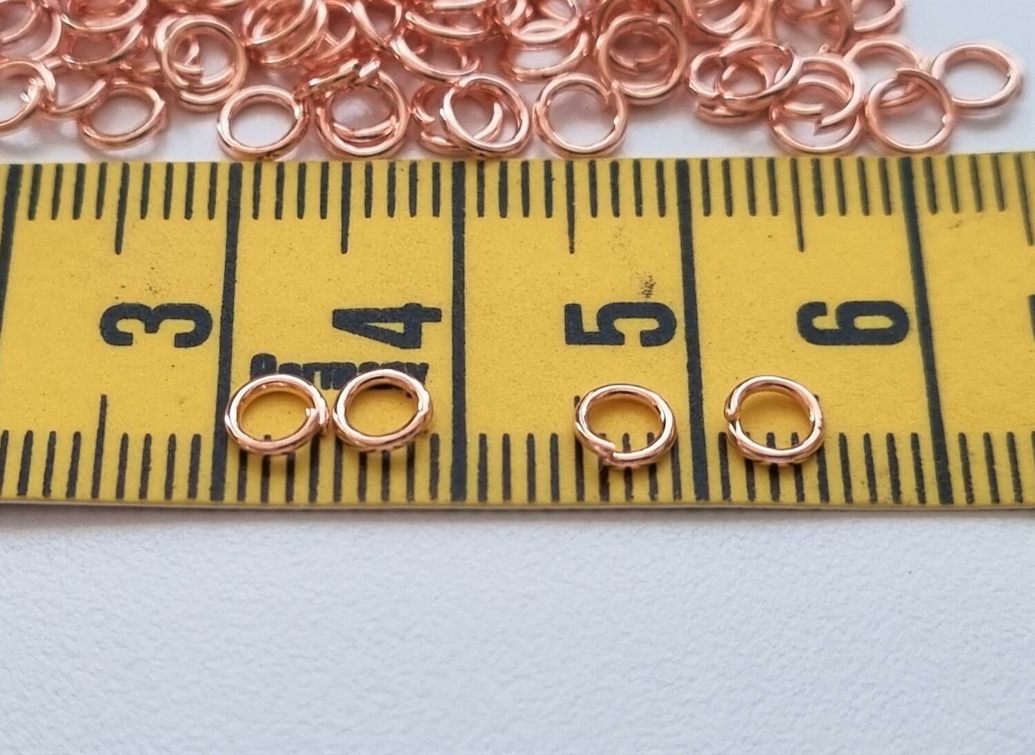 100 st jumprings / bindringar (4 mm, roseguld)