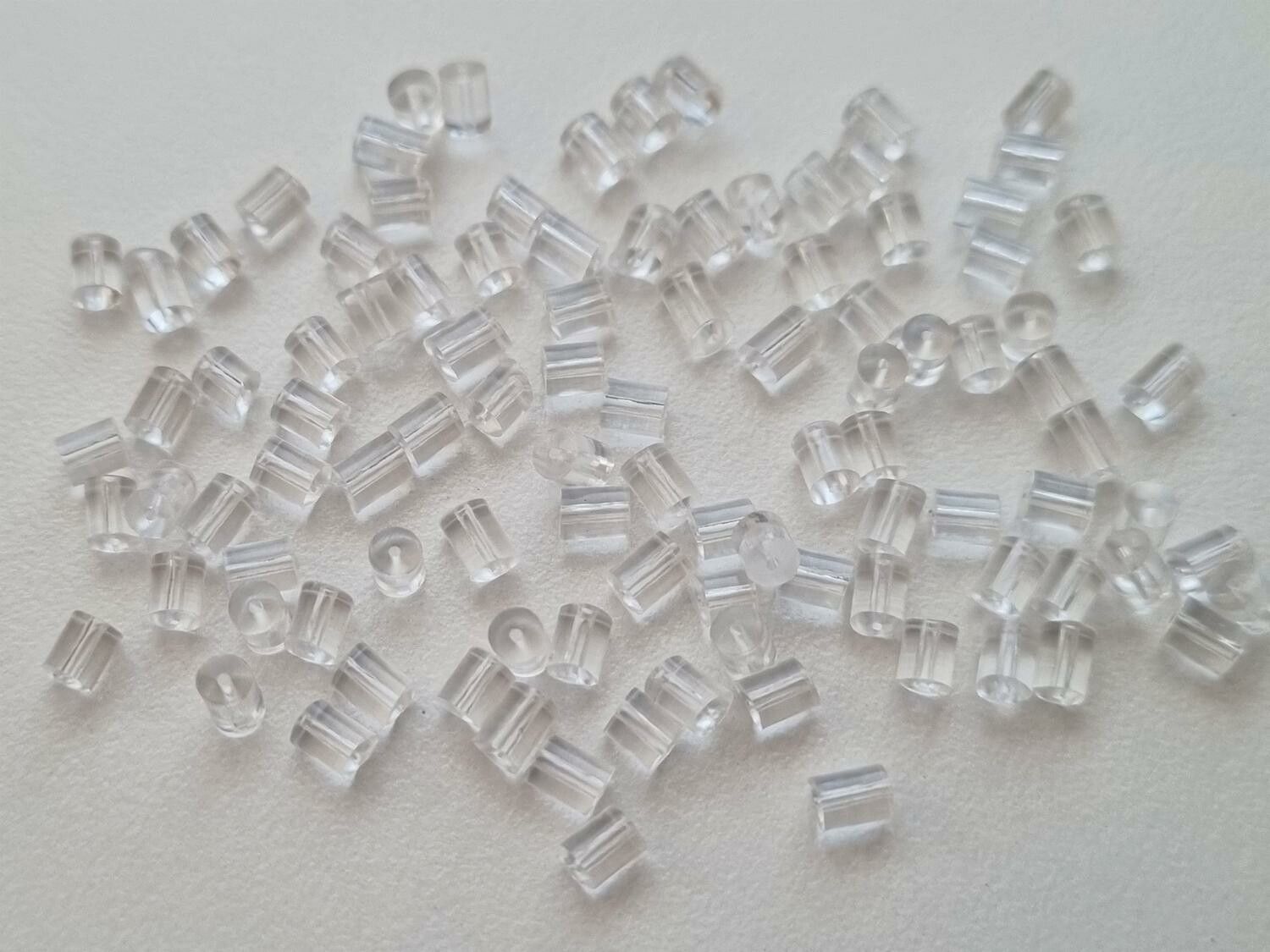 50 st pluppar bakstycken stoppers för örhängen (cylinderformade)