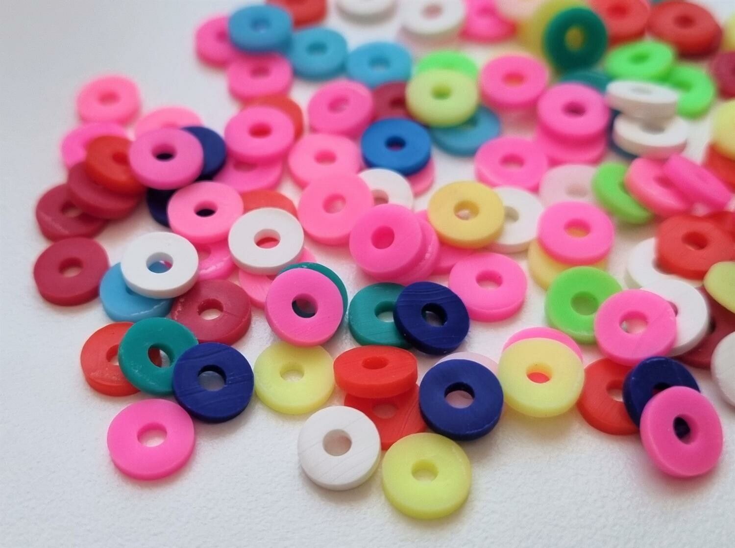 100 st pärlor, mjuka ringar i polymerlera  (6 mm i diameter)