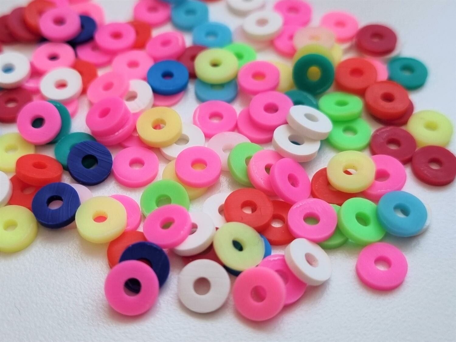 100 st pärlor, mjuka ringar i polymerlera  (6 mm i diameter)