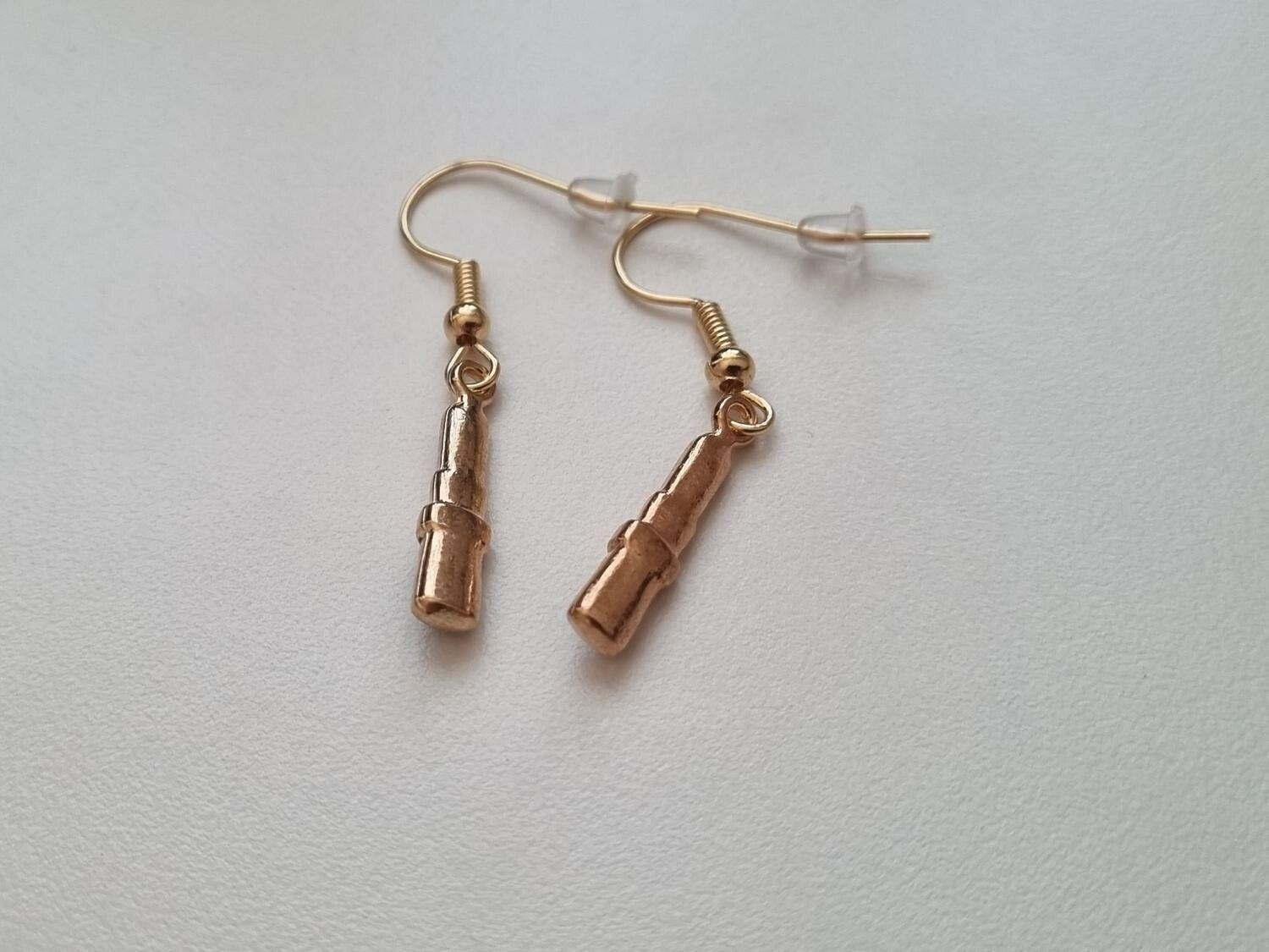 Örhängen, läppstift, miniläppstift