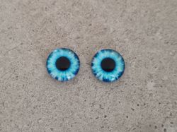 2 st drakögon kattögon i glas, glasinfattningar, cabochoner (12 mm)