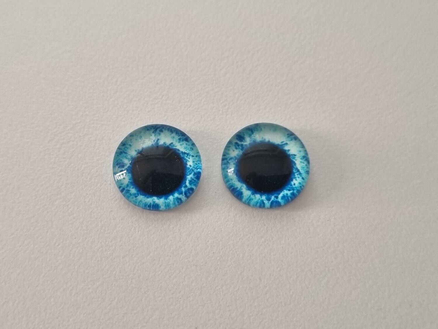 2 st drakögon kattögon i glas, glasinfattningar, cabochoner (12 mm)