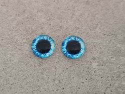 2 st drakögon kattögon i glas, glasinfattningar, cabochoner (12 mm)