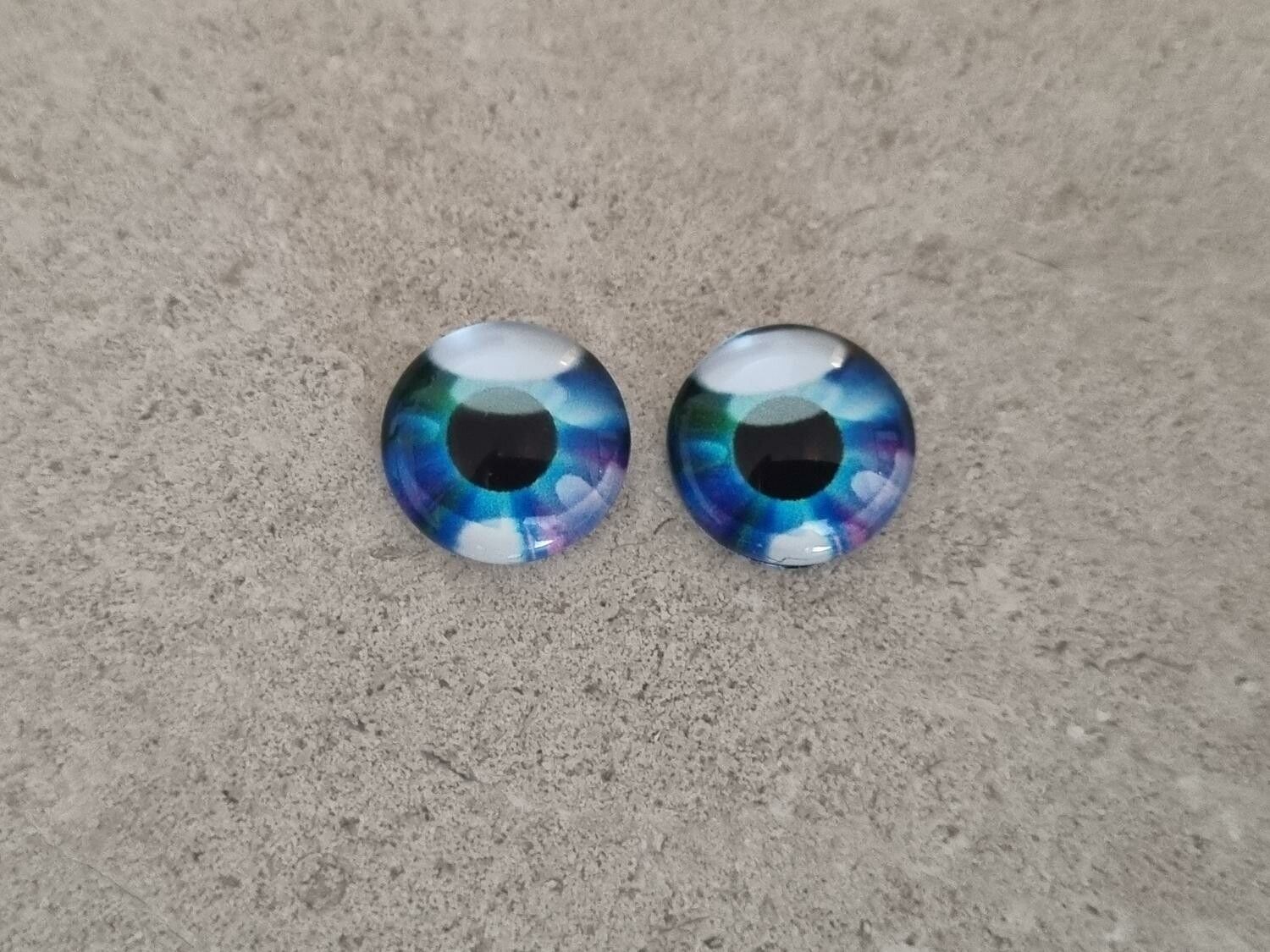 2 st drakögon kattögon i glas, glasinfattningar, cabochoner (12 mm)