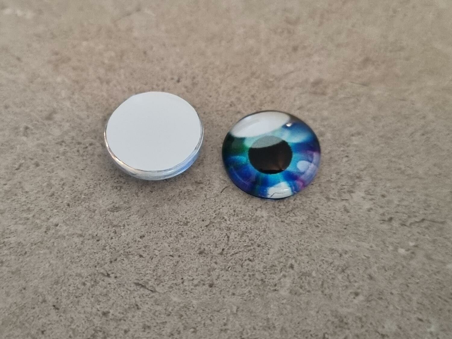 2 st drakögon kattögon i glas, glasinfattningar, cabochoner (12 mm)