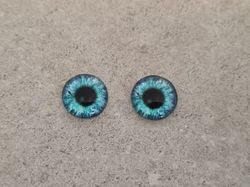 2 st drakögon kattögon i glas, glasinfattningar, cabochoner (12 mm)