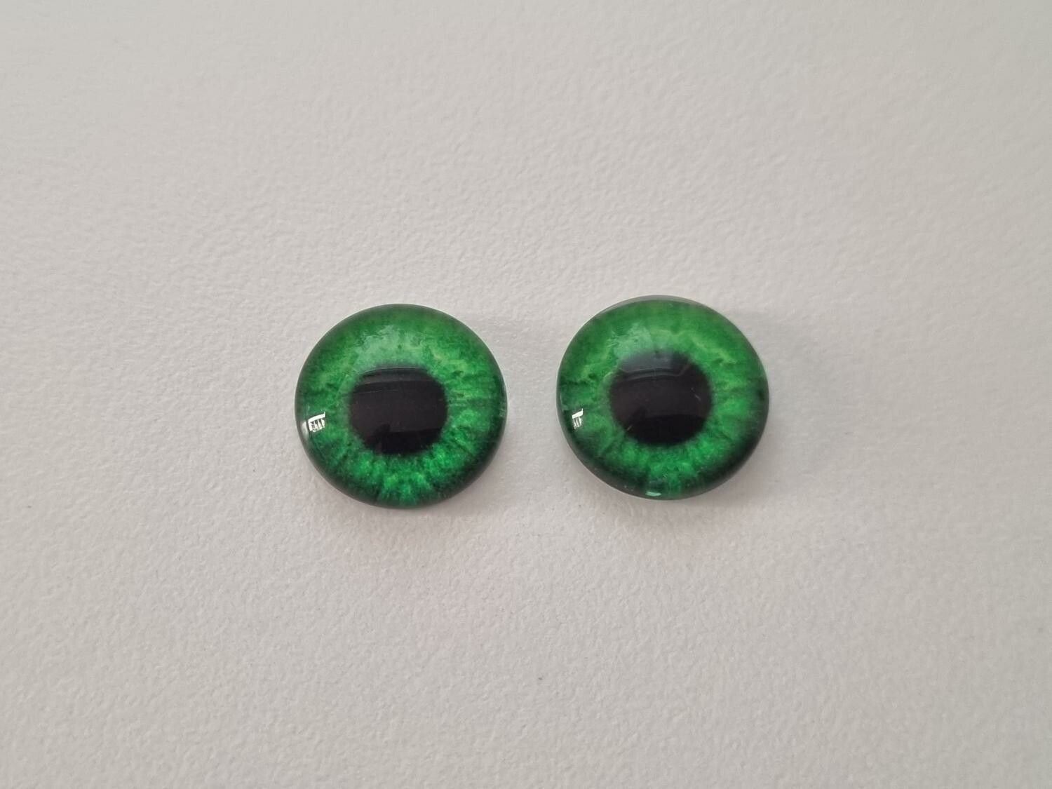 2 st drakögon kattögon i glas, glasinfattningar, cabochoner (12 mm)