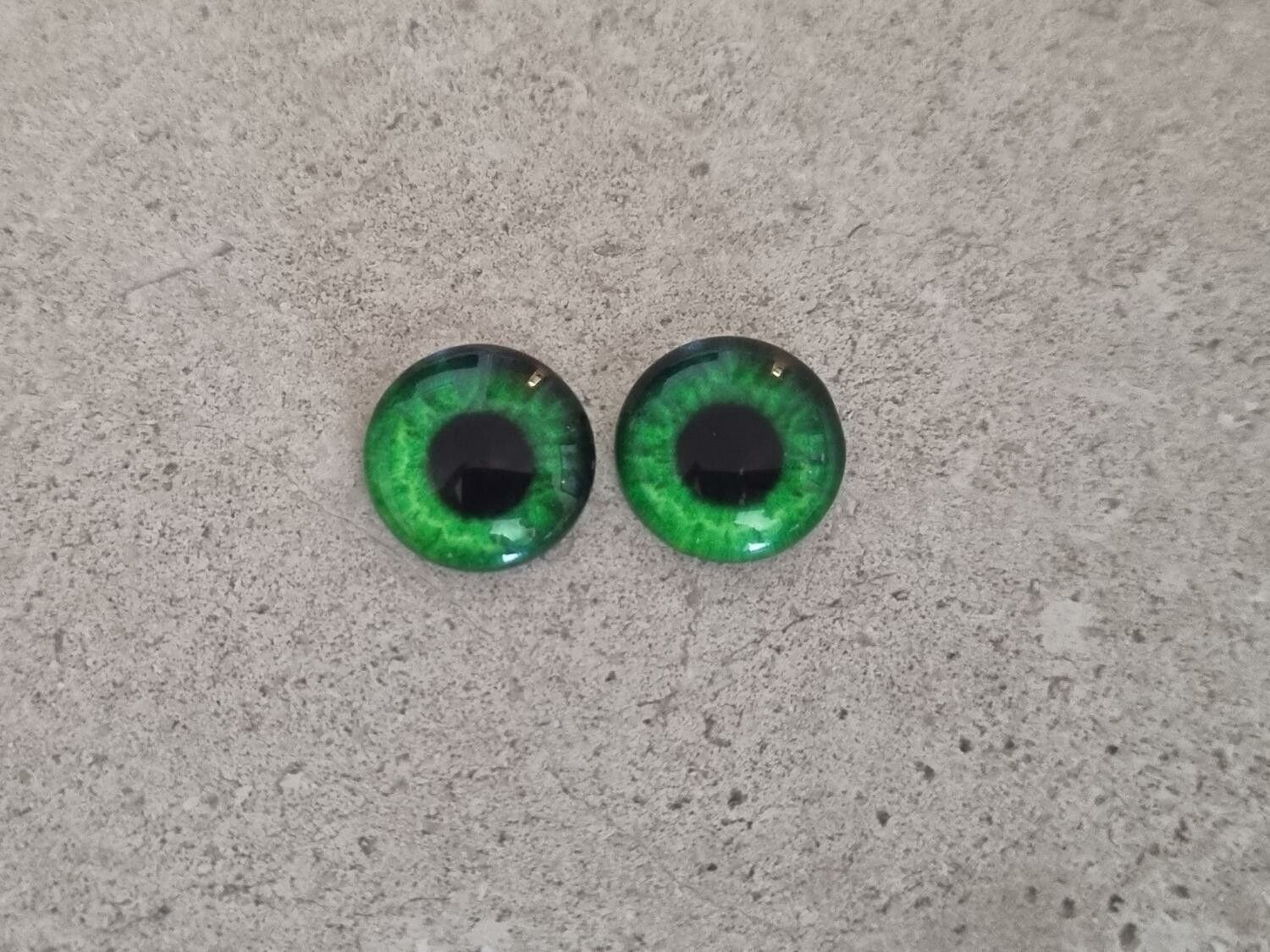 2 st drakögon kattögon i glas, glasinfattningar, cabochoner (12 mm)