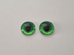 2 st drakögon kattögon i glas, glasinfattningar, cabochoner (12 mm)