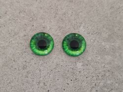 2 st drakögon kattögon i glas, glasinfattningar, cabochoner (12 mm)