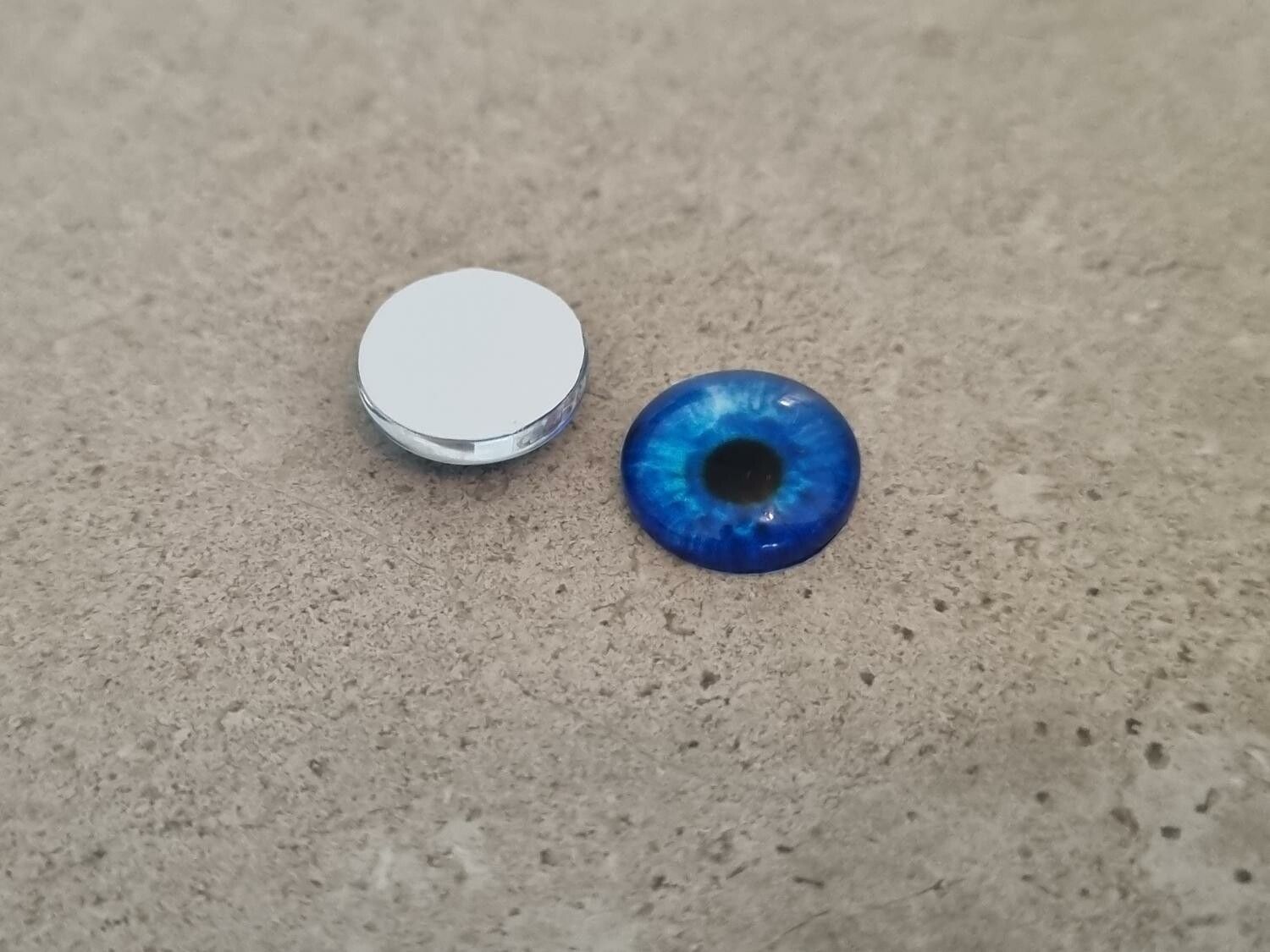 2 st drakögon kattögon i glas, glasinfattningar, cabochoner (12 mm)