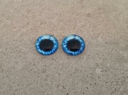 2 st drakögon kattögon i glas, glasinfattningar, cabochoner (12 mm)