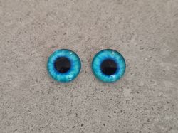 2 st drakögon kattögon i glas, glasinfattningar, cabochoner (12 mm)