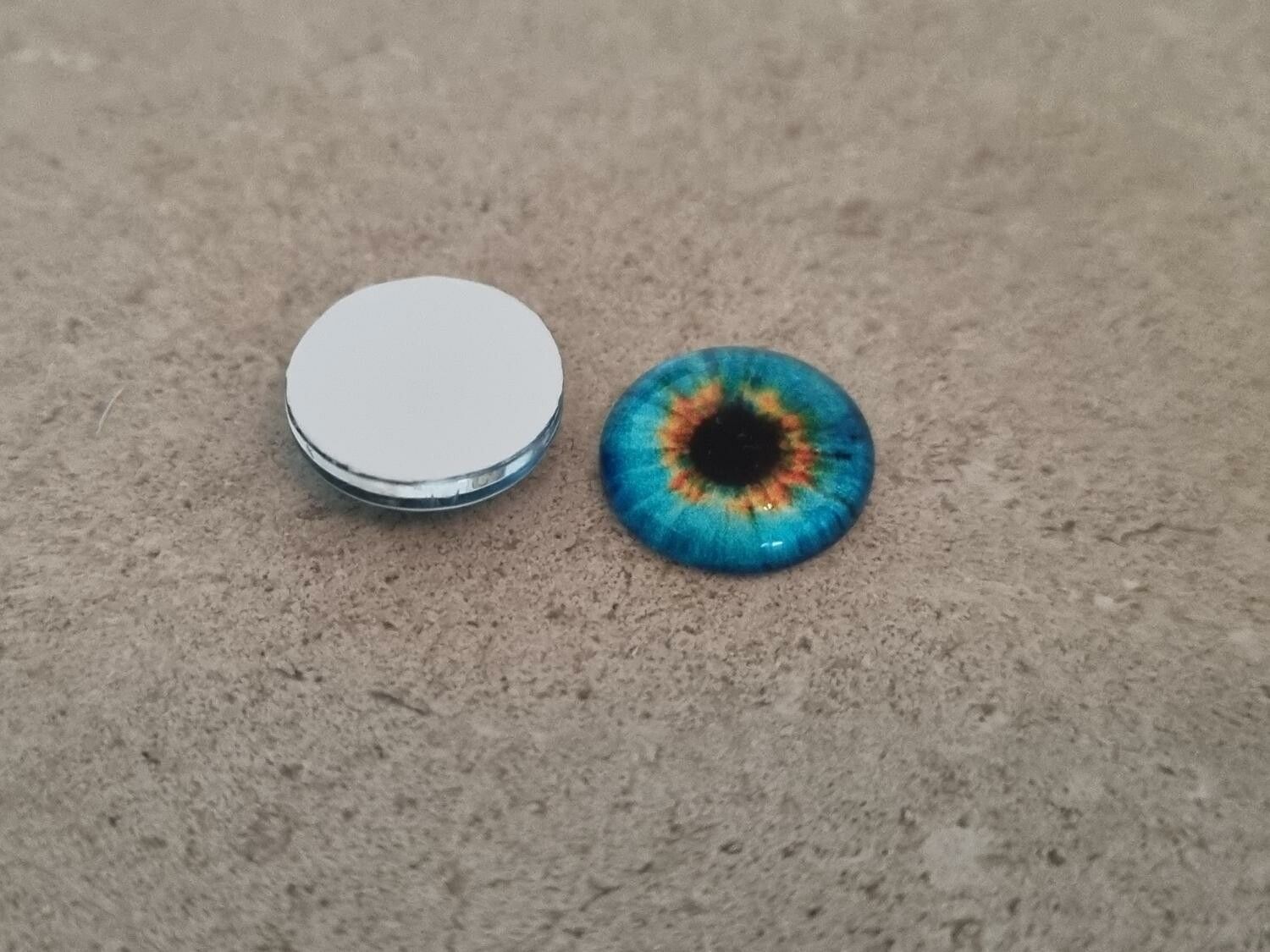 2 st drakögon kattögon i glas, glasinfattningar, cabochoner (12 mm)